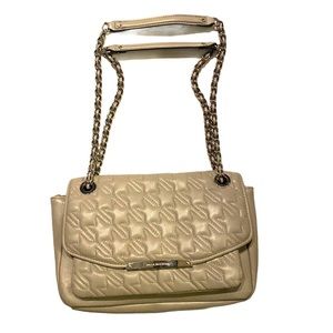 Dana Buchman quilted leather shoulder purse.